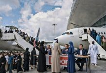 FORGOTTEN CITIZENS: The Real Cost of a Migration Policy That Prioritises Global Profit Over Local Safety and Social Cohesion. Migrant Crowd disembarking from aeroplanes at Sydney Airport.