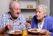 A Small Lift in Hard Times: Navigating the April 2026 Centrelink Changes Elderly couple sharing a meal.